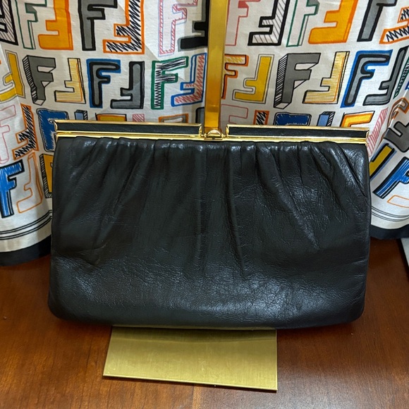 Etra Handbags - Vintage Etra Black Leather Clutch with Gold Accents